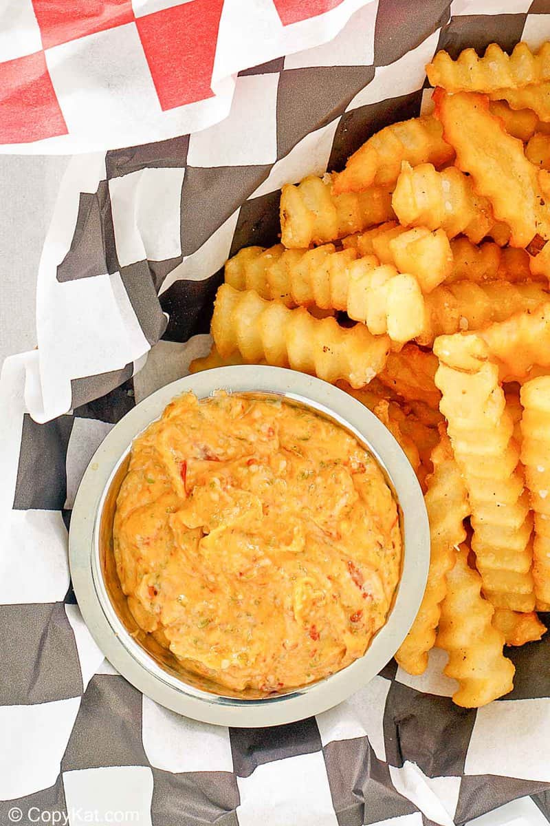 A bird's-eye view of a bowl of fries and homemade Whataburger ice cream