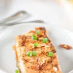 air fried salmon with almonds on a plate