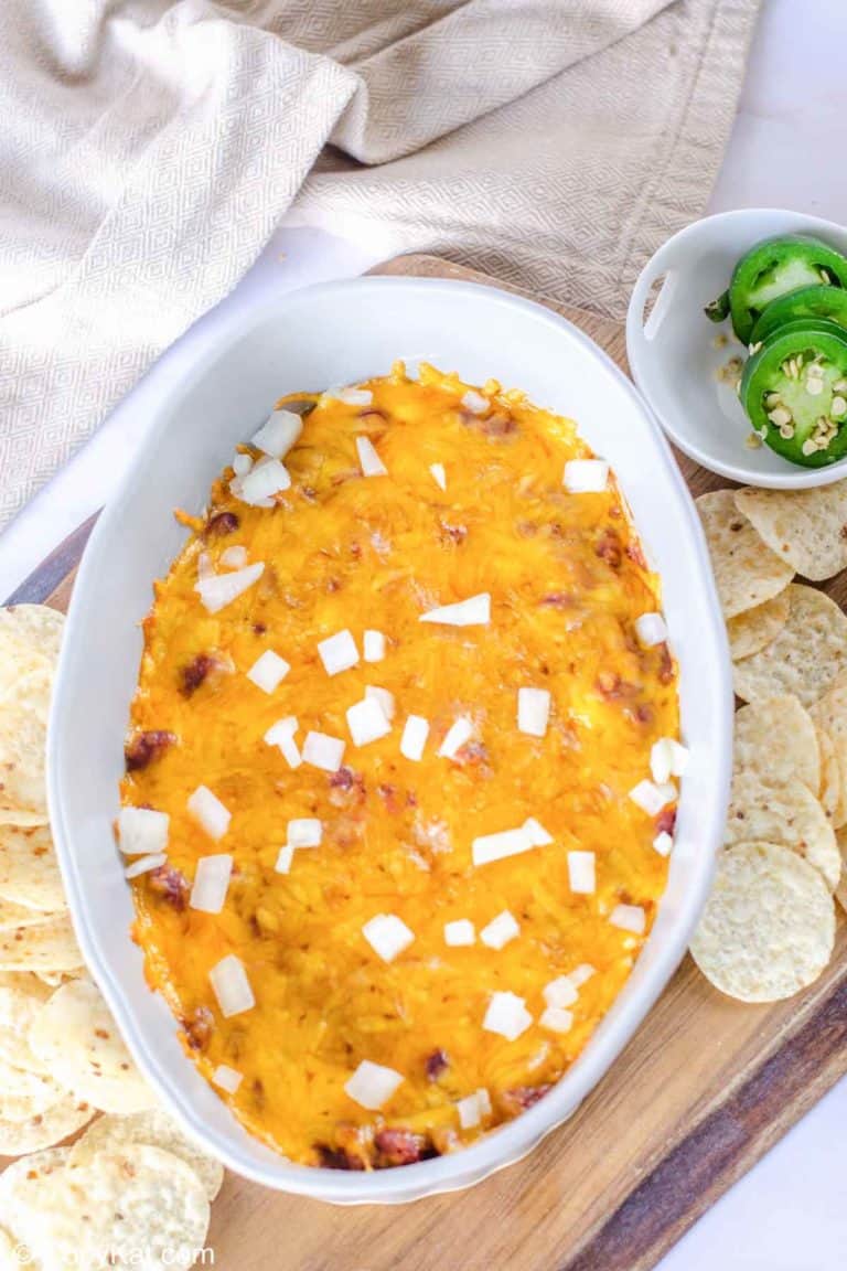chili cheese dip, jalapeno pepper slices, and tortilla chips