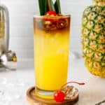homemade PF Chang Mai Tai, pineapple, and cocktail shaker