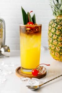 homemade PF Chang Mai Tai, pineapple, and cocktail shaker