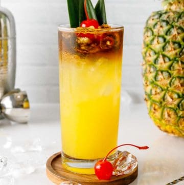 homemade PF Chang Mai Tai, pineapple, and cocktail shaker