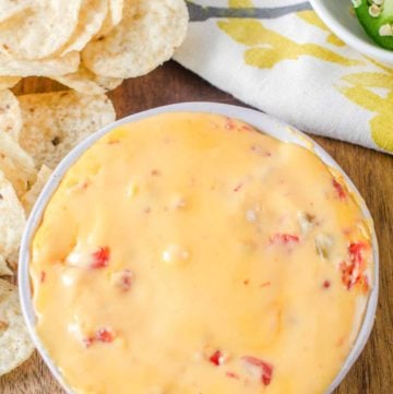 rotel dip in a bowl and tortilla chips