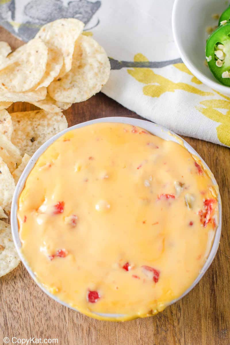 rotel dip in a bowl and tortilla chips