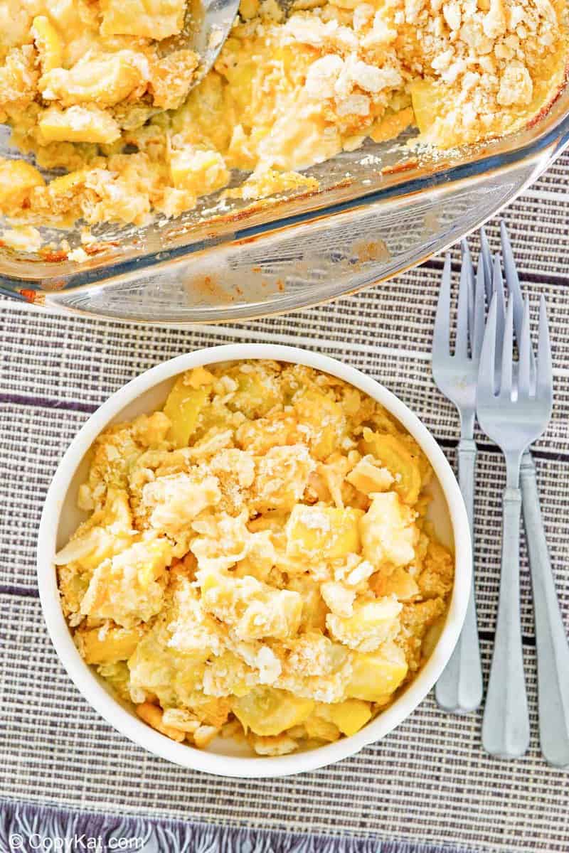 overhead view of squash casserole in a bowl and baking dish