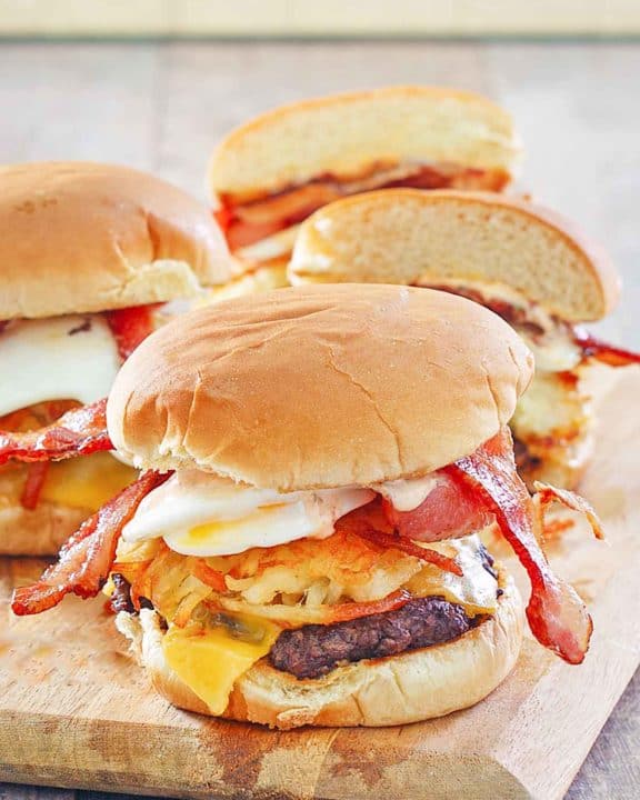 homemade Whataburger breakfast burgers on a wood board