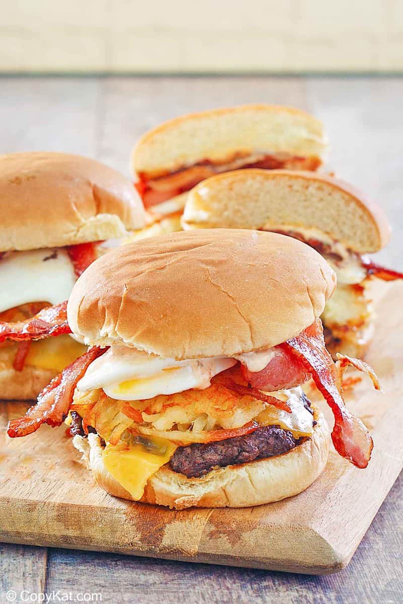 homemade Whataburger breakfast burgers on a wood board