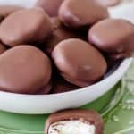 homemade York Peppermint Patties in a dish and one with a bite out of it