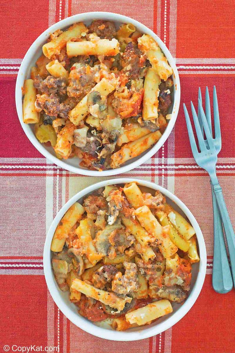 overhead view of baked ziti in two bowls