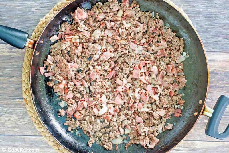 browned ground beef, bacon, and onions for calico beans