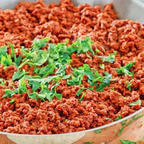 chili colorado con carne in a skillet