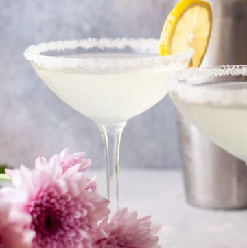 lemon drop martini garnished with a lemon slice