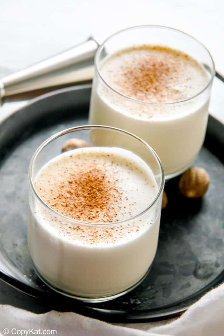 two glasses of milk punch on a tray
