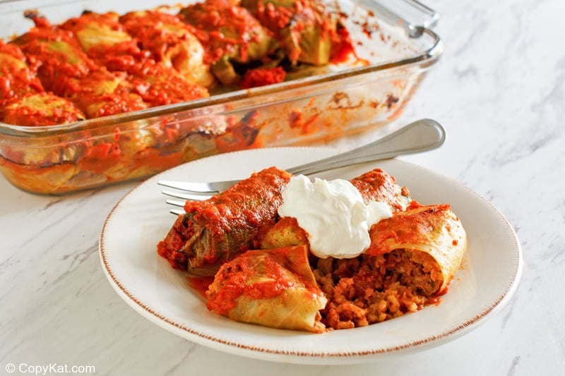 stuffed cabbage rolls and a fork on a plate