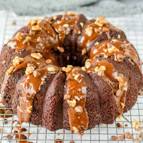 glazed chocolate bundt cake on a wire rack.