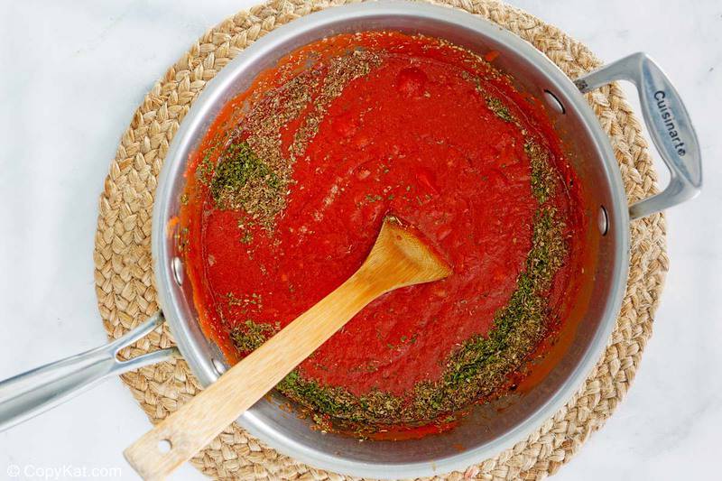 cooking homemade spaghetti sauce mixture in a pan