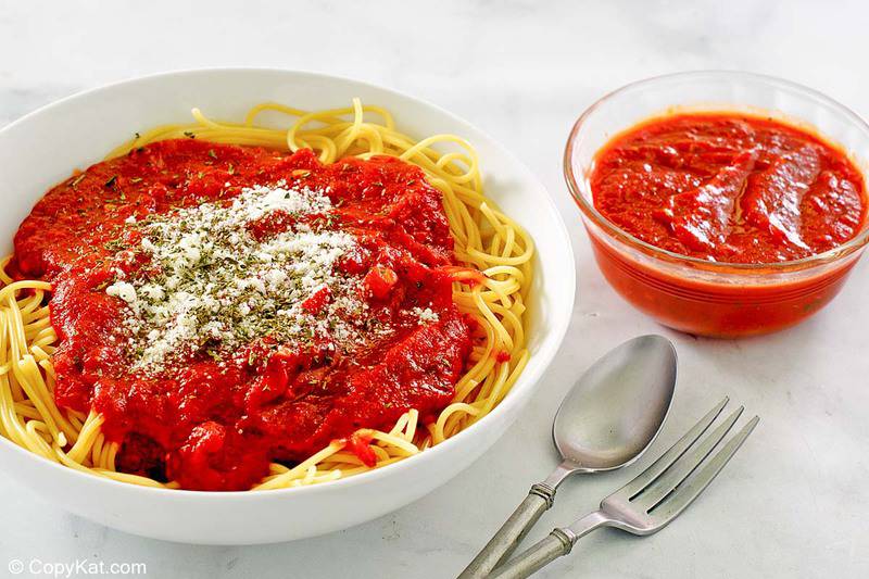 homemade spaghetti sauce on pasta and in a bowl