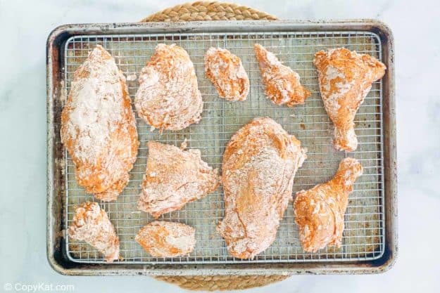 breaded chicken on a wire rack