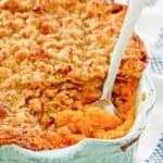 sweet potato souffle with pecans in a baking dish