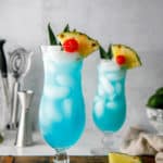 two glass of homemade Olive Garden Blue Hawaiian cocktails