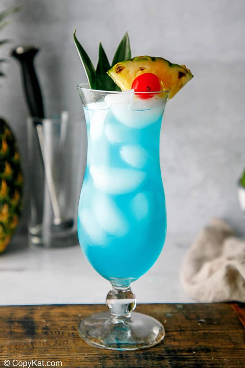 a homemade Olive Garden Blue Hawaiian cocktail in a hurricane glass