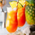 two glasses of homemade TGI Friday's Captain Morgan Island Rum Punch cocktail