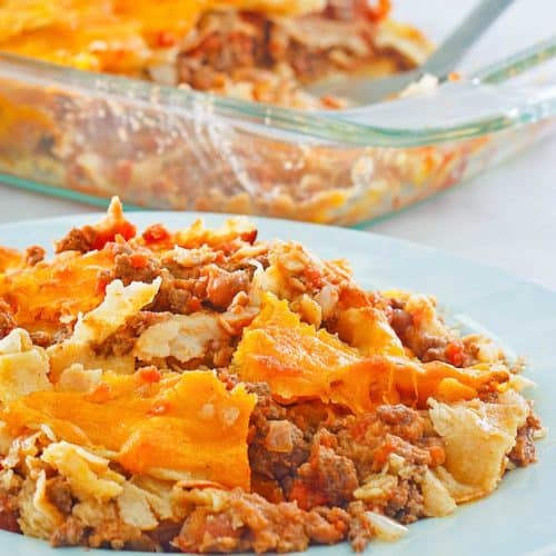 taco casserole on a plate and in a baking dish