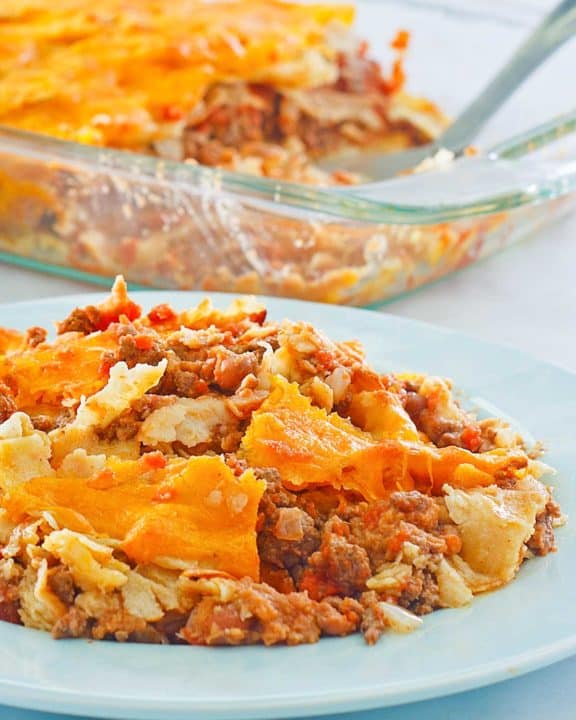 taco casserole on a plate and in a baking dish