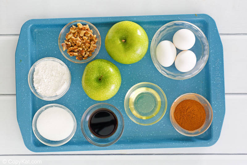 apple muffins ingredients on a tray