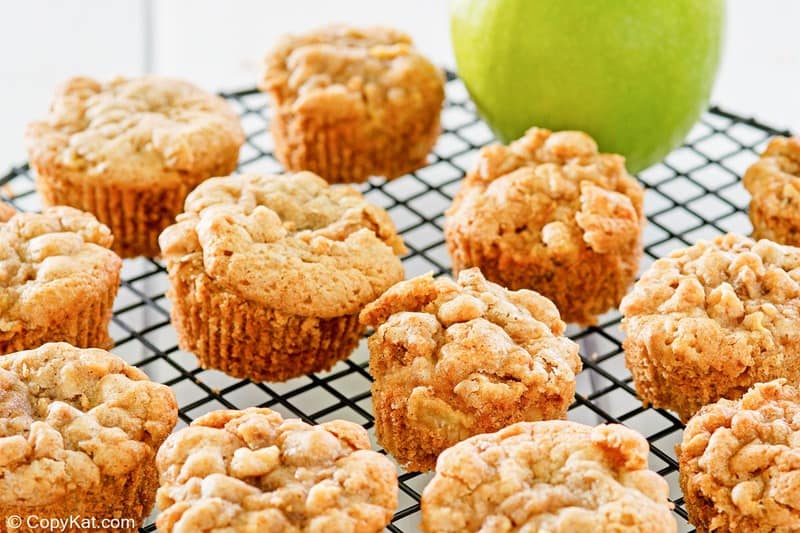 cinnamon apple muffins on a wire rack