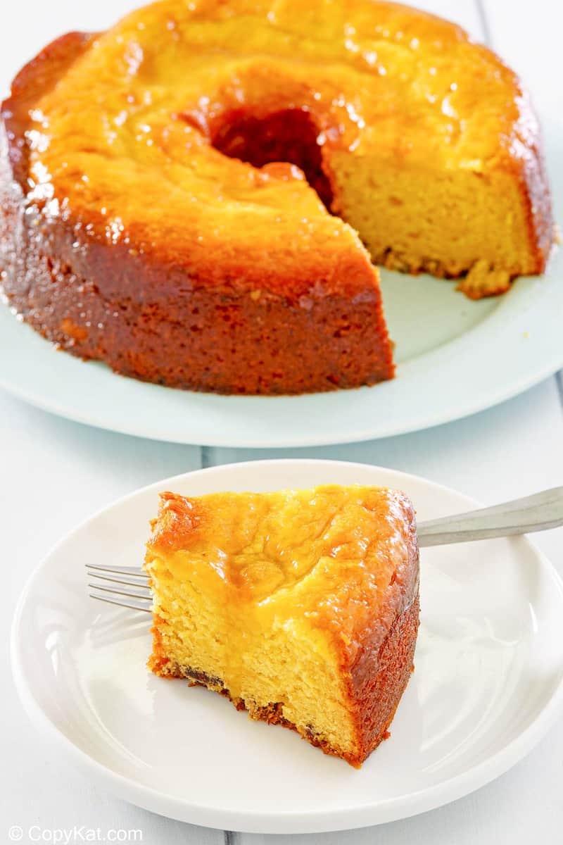 Bacardi Rum Cake on a platter and a slice on a plate.