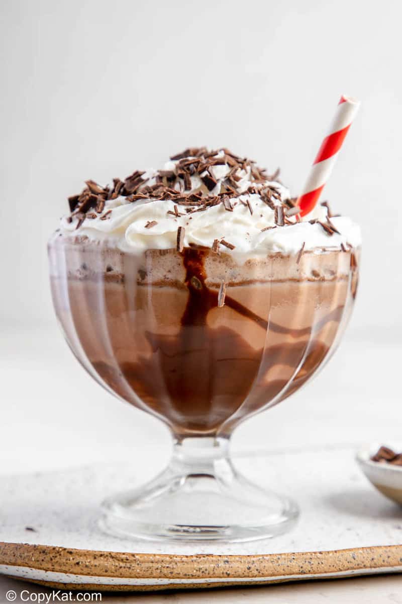 Frozen hot chocolate topped with whipped cream and chocolate shavings.