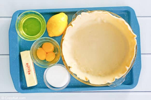 lemon meringue pie ingredients on a tray