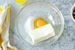 cream cheese, egg, sugar, and vanilla in a bowl