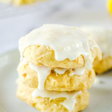 three pineapple cookies stacked on a plate