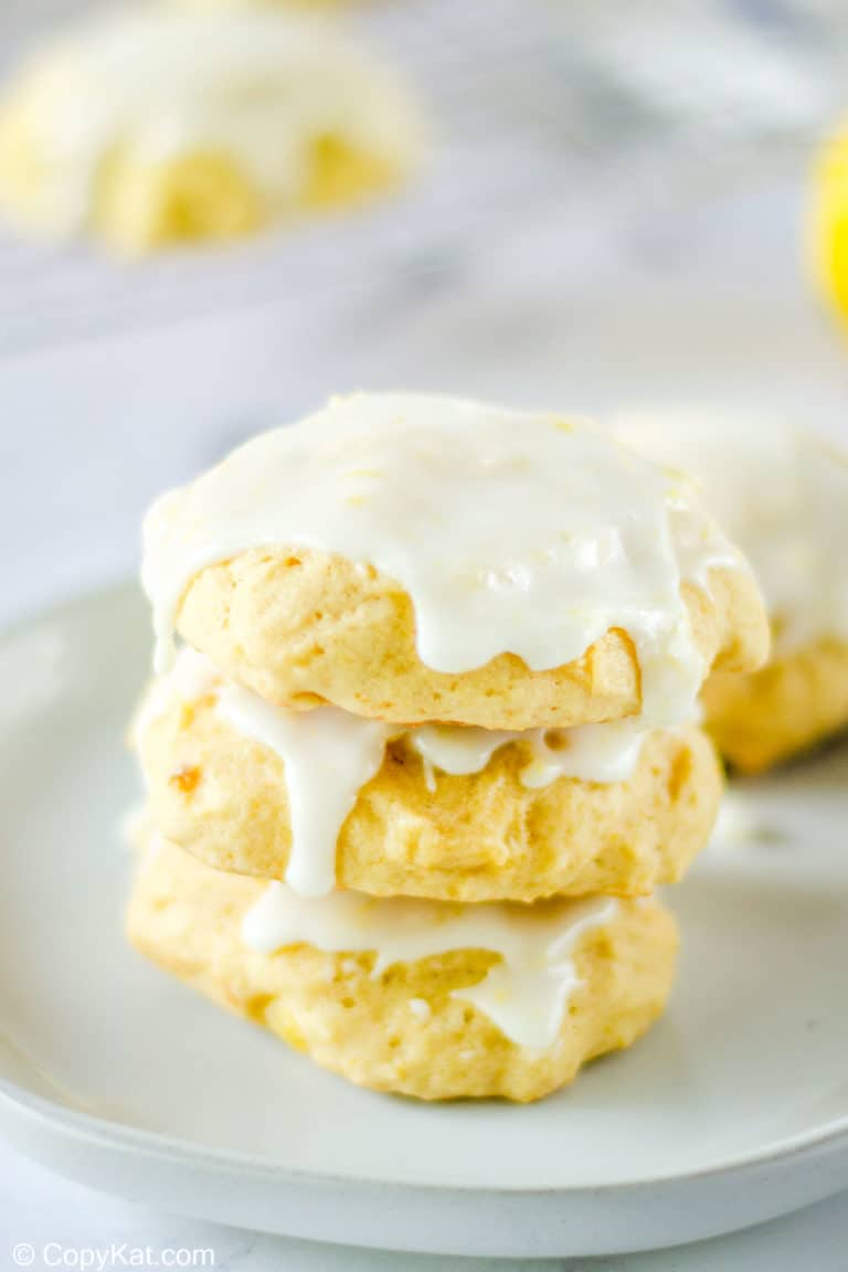 three pineapple cookies stacked on a plate