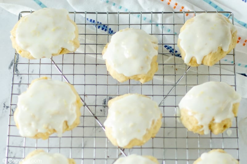 iced pineapple cookies on a wire rack
