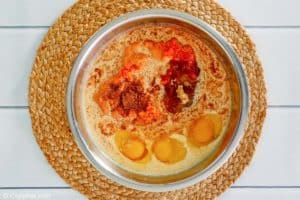 pumpkin dump cake ingredients in a bowl