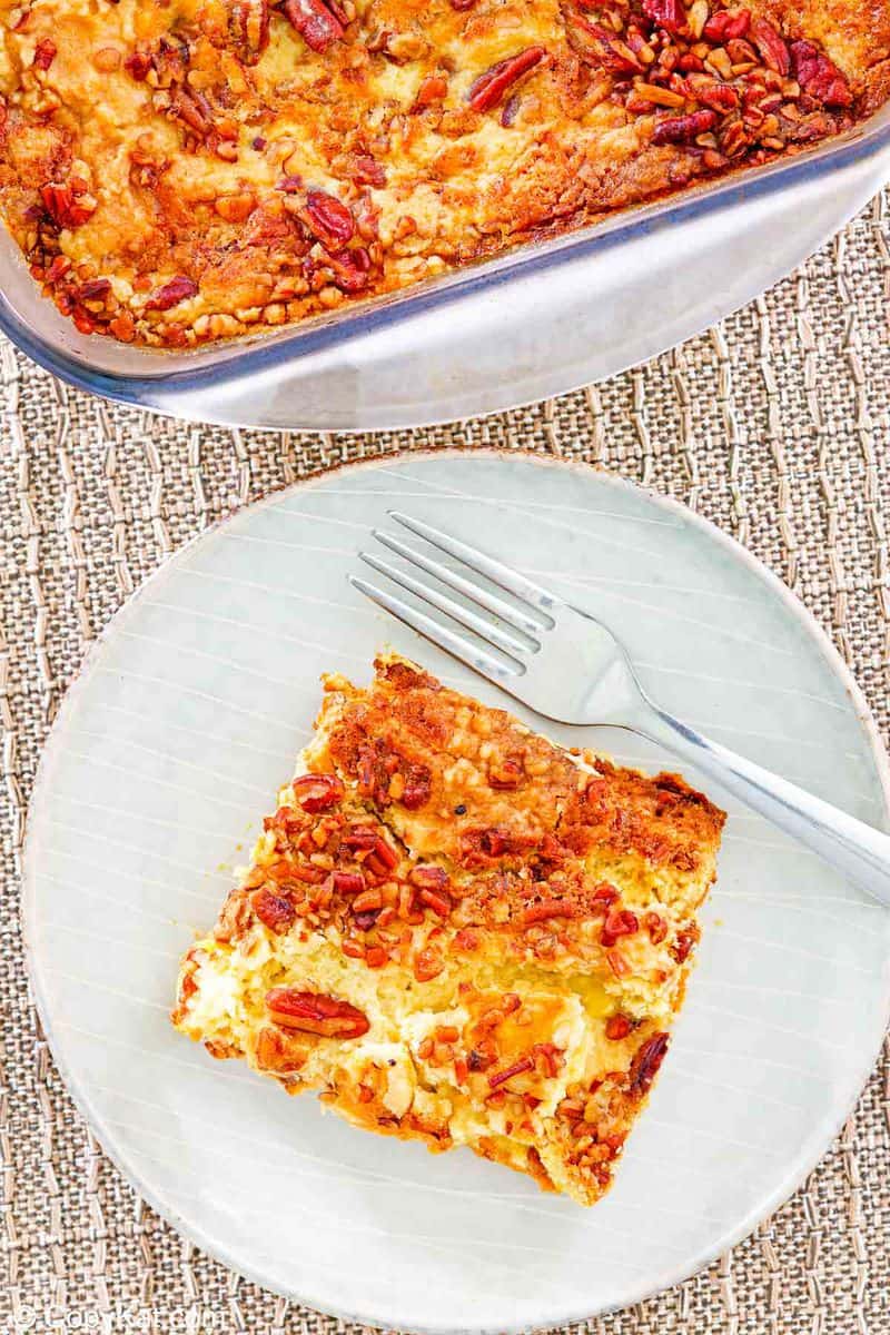 overhead view of pumpkin dump cake and a slice on a plate