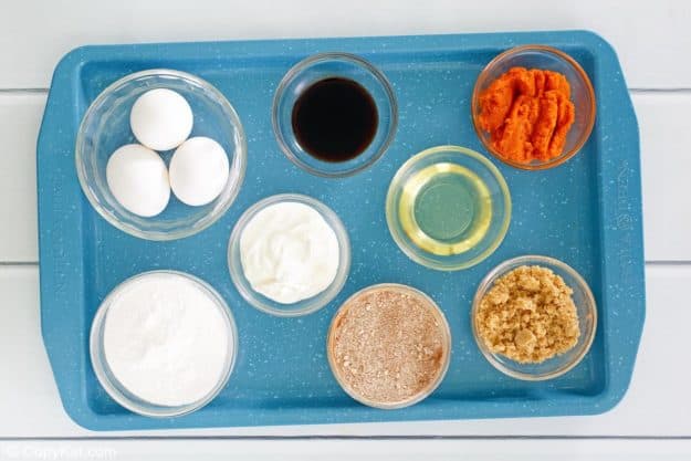 pumpkin muffins with cake mix ingredients on a tray