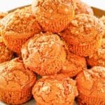 a pile of pumpkin muffins on a tray