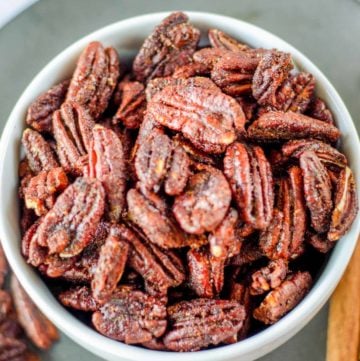 overhead view of a bowl of spiced pecans