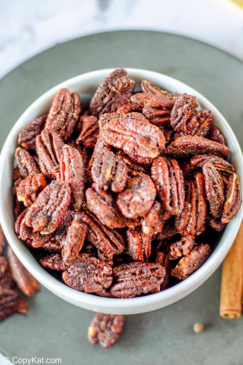 overhead view of a bowl of spiced pecans