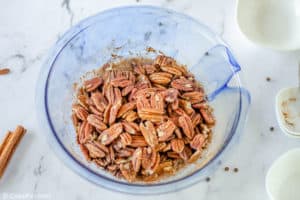 pecans and coating mixture in a bowl