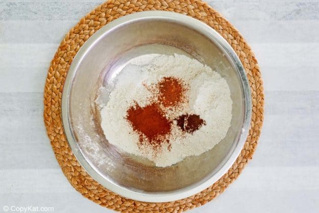 apple bread dry ingredients in a mixing bowl.