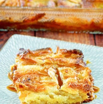 apple bread pudding with caramel sauce on a plate.