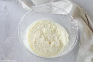 cream cheese frosting in a mixing bowl.