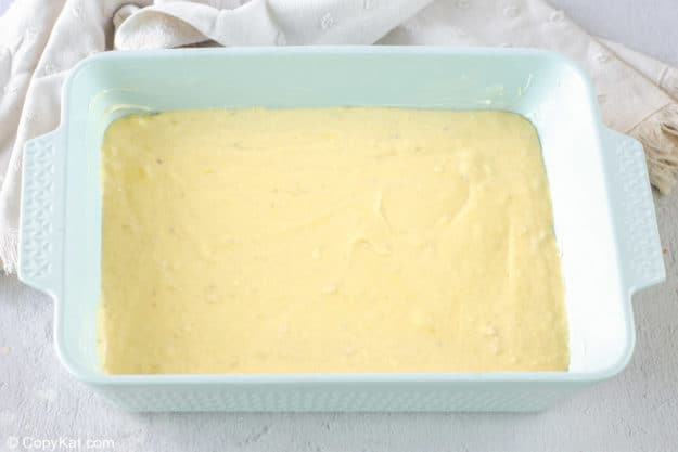 banana cake batter in a baking dish.