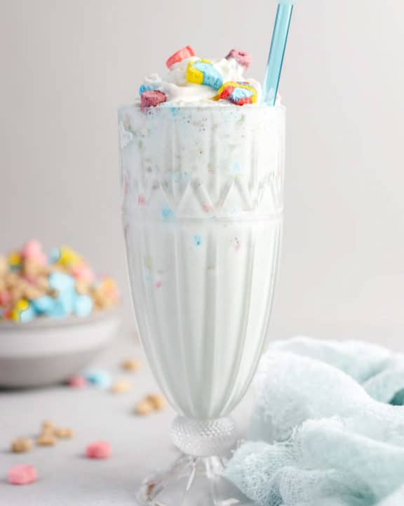 homemade Burger King Lucky Charms milkshake and a blue kitchen towel.