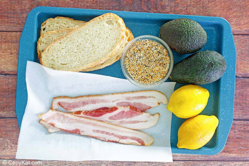 Dunkin Donuts avocado toast ingredients on a tray.